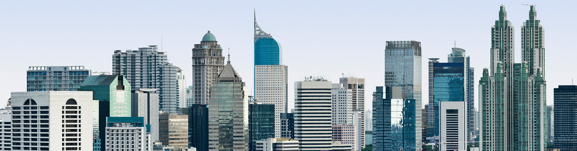 carrier-service-technician-in-equipment-room-servicing-panel-crop