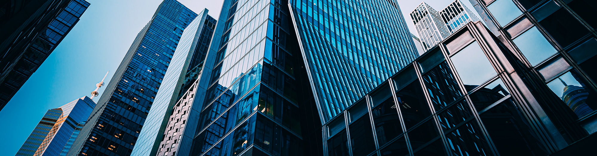 carrier-service-technician-in-equipment-room-servicing-panel-crop